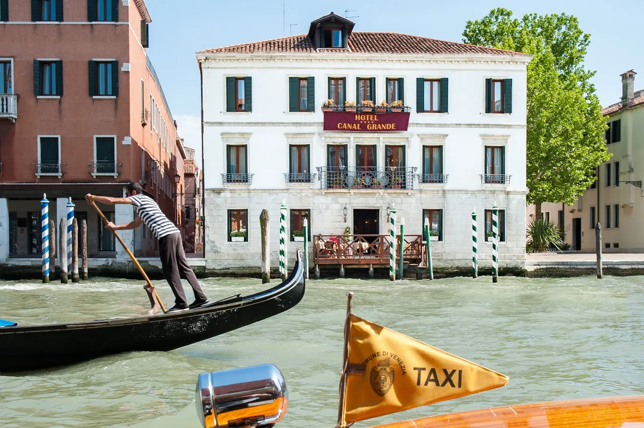 Canal Grande Hotel exterior and canal frontage in San Marco, Venice